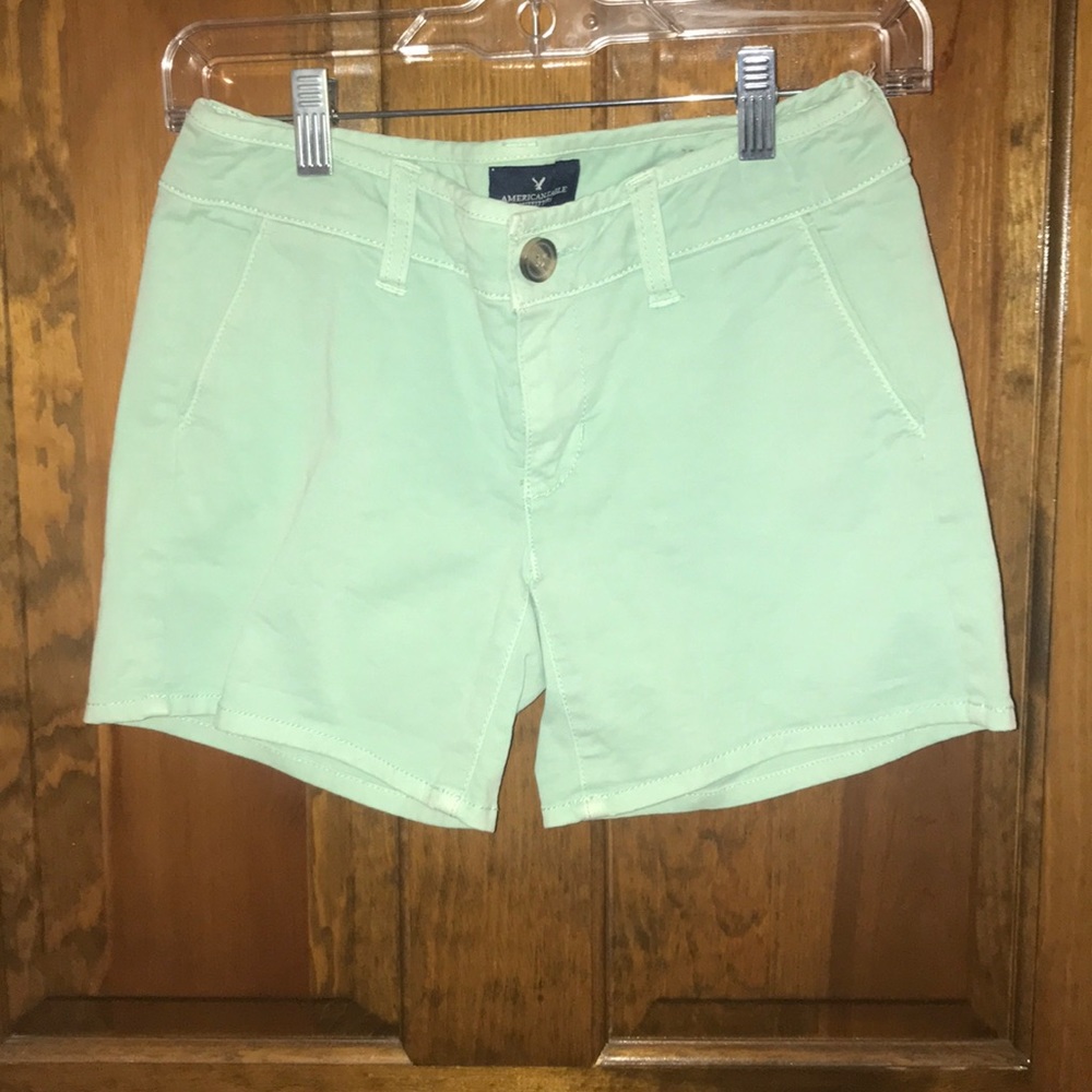 Light blueish/green shorts